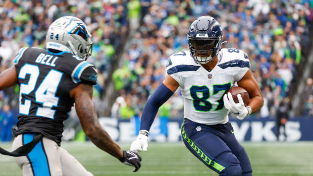 Sep 24, 2023; Seattle, Washington, USA; Seattle Seahawks tight end Noah Fant (87) runs for yards after the catch against the Carolina Panthers during the third quarter at Lumen Field. Mandatory Credit: Joe Nicholson-USA TODAY Sports